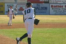 Brian Chatterton throws to first from third