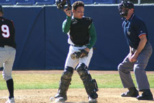 Bryce Ayoso stands behind the plate