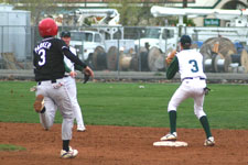 Andrew Law assists Tyler Cardon in ending the inning