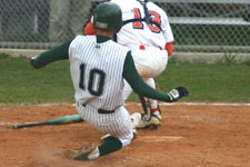 Brian Chatterton slides into home plate
