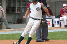 Austin Rowberry touches home plate