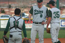 Coach Moore talks with catcher Bryce Ayoso and pitcher Chris Wright