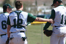 Brock Brimhall, Bryce Ayoso, and Coach Moore meet on the mound