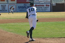 Brian Chatterton throws to first