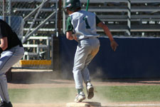 Travis Ayoso standing on third base