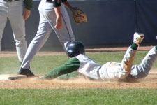 Andrew Law slides head first into third base
