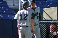 Brock Brimhall talks with head coach Lance Moore