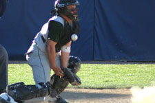 Bryce Ayoso stops a low pitch from behind the plate