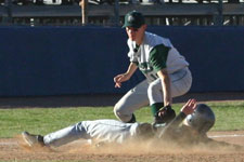 Brian Chatterton recieves the throw and tags out the stealing base runner