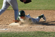Tyler Cardon dives successfully back to first base