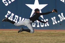 Opponent outfielder barely misses the outstanding diving catch