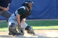 Bryce Ayoso hangs onto a pitch in the dirt