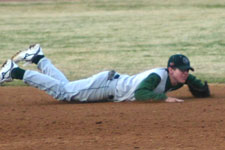 Andrew Law dives to ball going up the middle