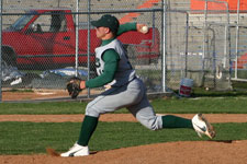 Bryce Ayoso pitches as Brian Chatterton waits for the ball