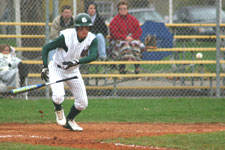 Brian Chatterton lays the sacrifice bunt