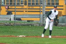 Brian Chatterton throws out runner at first base