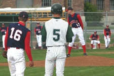 Austin Rowberry stands on first base