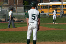 Austin Rowberry stands on first base