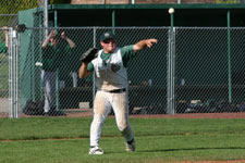 Curtis Porter fields the bunt and throws to first