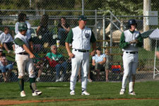 Coach Moore next to Bryce Ayoso and Andrew Law