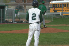 Andrew Law stands on first base