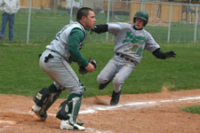 Bryce Ayoso covers home plate as Payson's only runner scores