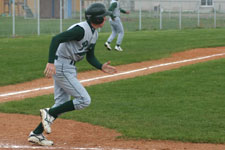 Drew Hortman runs towards first base