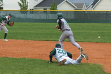Shawn Stinson dives for liner through the gap
