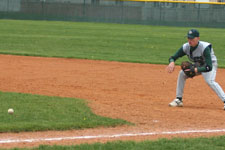 Shawn Stinson picks up the grounder and makes the out