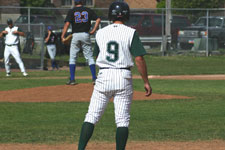 Clint Phillips stands on first