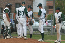 Provo's infield meet on the mound before the inning