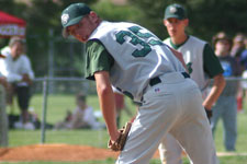 Chris Wright eyes the runner on first from the mound