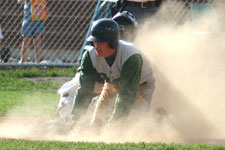 Andrew Law slides safely home