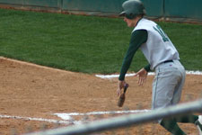 Brian Chatterton successfully lays a sacrafice bunt to move the runners over
