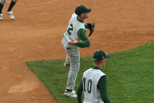 Andrew Law throws the ball to the first baseman