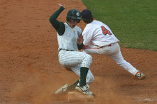 Austin Rowberry safe at third base