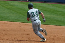 Curtis Porter rounding first on his way to second