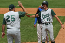 Dustin Migliaccio gets a high five from coach Preece