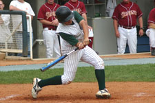 Clint Phillips hits a single, batting in a run