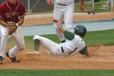 Travis Ayoso slides safely into third base