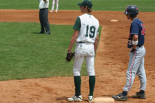 Dustin Migliaccio covering first base