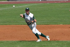 Brian Chatterton slips while throwing to first