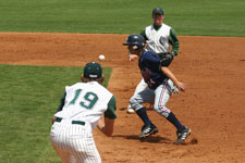 Andrew Law throws to Dustin Migliaccio in pickle situation