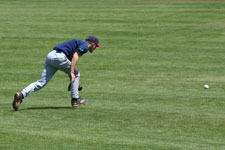 Tyler Cardon hits the ball past this fielder