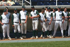 Provo dugout, Dustin Migliaccio eats a banana