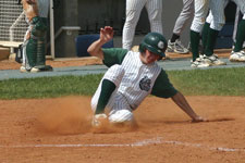 Drew Hortman slides safely home