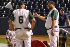 Coach Moore and coach Preece talk after loss