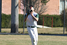 Travis Ayoso eyes the fly ball