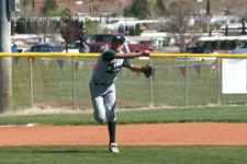 Craig Brimhall throws from third