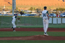 Craig Brimhall throws to second